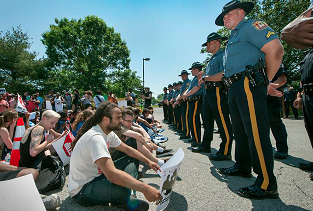 SLAP members protest at the headquarters of Sallie Mae, corporate owners of a large percentage of student debt.