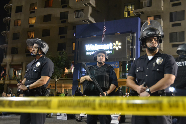 Los Angeles police officers showed up in force at the largest civil disobedience in Walmart history. Photo courtesy of Making Change at Walmart.