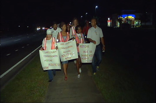 Lake County public transit riders stage march along canceled bus route